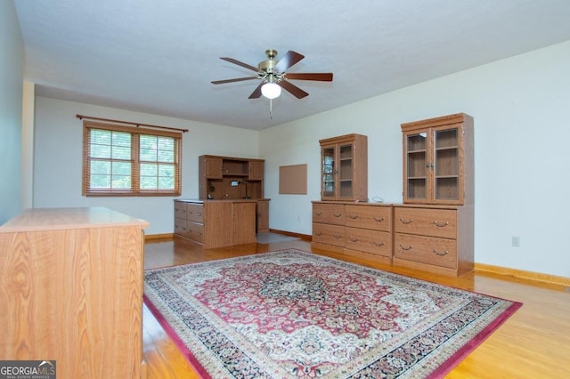 65 Pine Haven Ct, Carrollton, GA 30116 - bedroom featuring wood finished floors, baseboards, and ceiling fan