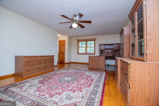 65 Pine Haven Ct, Carrollton, GA 30116 - office area featuring a ceiling fan, light wood finished floors, and baseboards