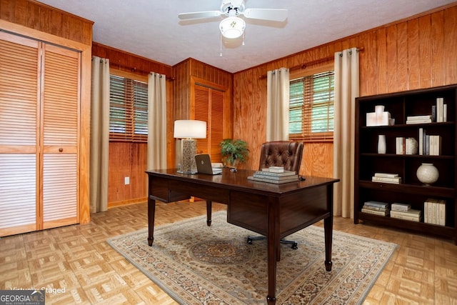 65 Pine Haven Ct, Carrollton, GA 30116 - office area with wooden walls, a ceiling fan, and baseboards