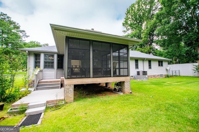 65 Pine Haven Ct, Carrollton, GA 30116 - back of house featuring a sunroom