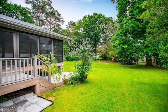 65 Pine Haven Ct, Carrollton, GA 30116 - view of green lawn with a sunroom
