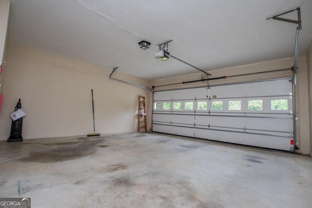 65 Pine Haven Ct, Carrollton, GA 30116 - garage featuring a garage door opener