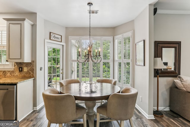 2624 E Madison Dr, Atlanta, GA 30360 - dining room featuring a chandelier and plenty of natural light