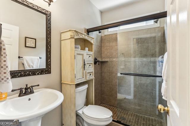 2624 E Madison Dr, Atlanta, GA 30360 - full bath featuring a sink, a shower stall, and toilet
