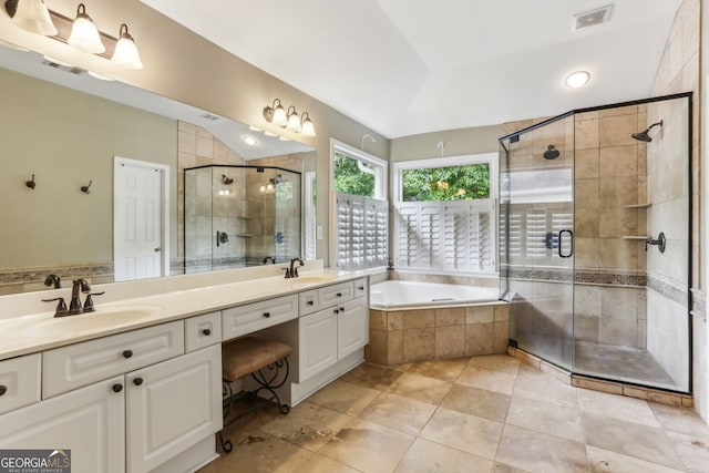 2624 E Madison Dr, Atlanta, GA 30360 - full bathroom featuring double vanity, a stall shower, a bath, and tile patterned floors