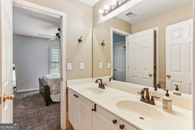 2624 E Madison Dr, Atlanta, GA 30360 - ensuite bathroom featuring a ceiling fan and double vanity
