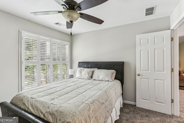 2624 E Madison Dr, Atlanta, GA 30360 - carpeted bedroom featuring a ceiling fan and baseboards