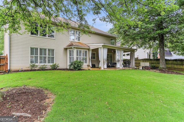 2624 E Madison Dr, Atlanta, GA 30360 - rear view of property with a patio
