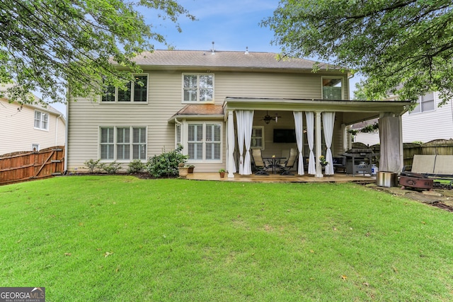 2624 E Madison Dr, Atlanta, GA 30360 - back of property featuring ceiling fan and a patio