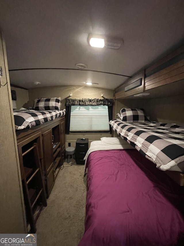 54 Candy Land Dr, Cleveland, GA 30528 - bedroom with light colored carpet, an AC wall unit, and lofted ceiling