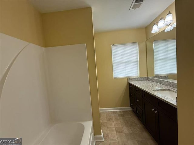 102 Daisy Cir, Mcdonough, GA 30252 - bathroom with vanity and baseboards