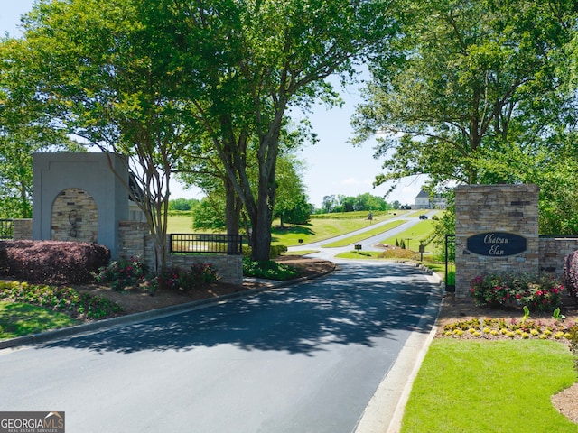 525 King Vlg, Braselton, GA 30517 - view of asphalt street featuring curbs