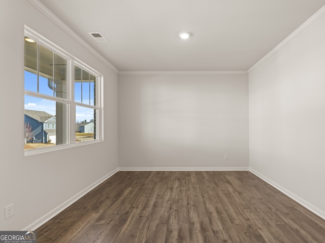 525 King Vlg, Braselton, GA 30517 - empty room featuring crown molding, dark wood-type flooring, and baseboards