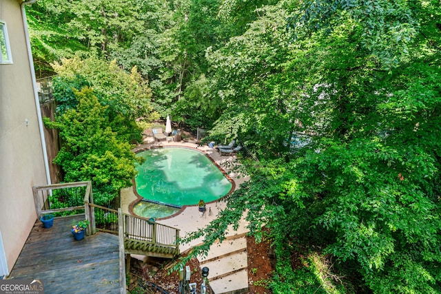 5105 Jett Forest Trl NW, Sandy Springs, GA 30327 - wooden terrace with a pool with connected hot tub