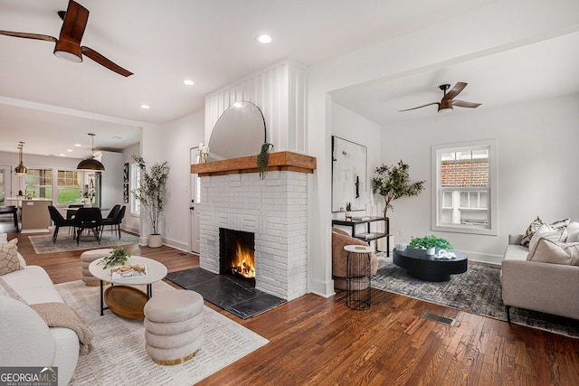 1721 S Gordon St SW, Atlanta, GA 30310 - living room with ceiling fan, wood finished floors, a brick fireplace, and recessed lighting