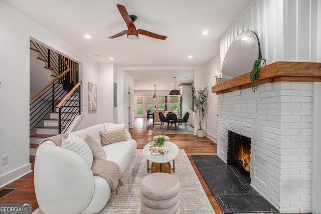 1721 S Gordon St SW, Atlanta, GA 30310 - living area featuring a ceiling fan, stairs, dark wood-style flooring, a brick fireplace, and recessed lighting