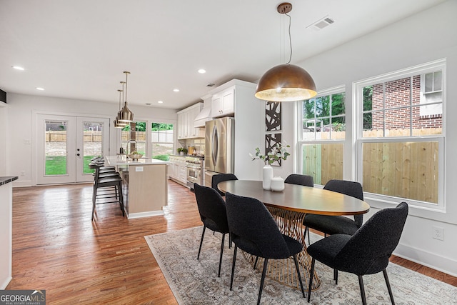1721 S Gordon St SW, Atlanta, GA 30310 - dining room with recessed lighting, light wood-style floors, and french doors