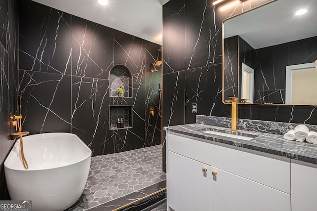 1721 S Gordon St SW, Atlanta, GA 30310 - full bathroom featuring tile walls, vanity, walk in shower, a freestanding bath, and recessed lighting