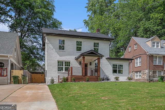 1721 S Gordon St SW, Atlanta, GA 30310 - view of front of home with a gate, a chimney, brick siding, and concrete driveway