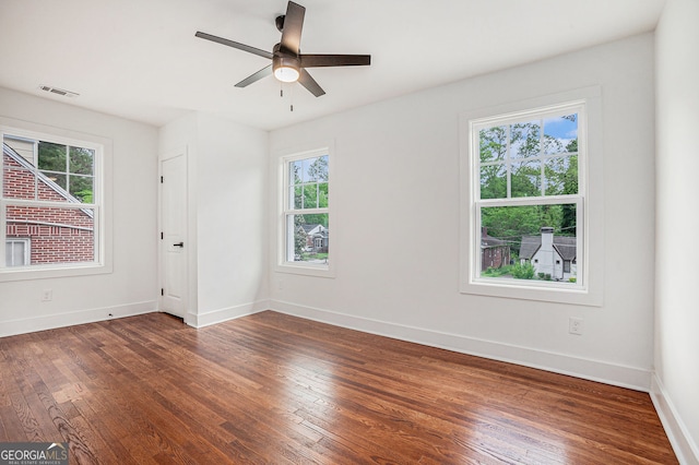 1721 S Gordon St SW, Atlanta, GA 30310 - unfurnished room featuring dark wood finished floors and a ceiling fan