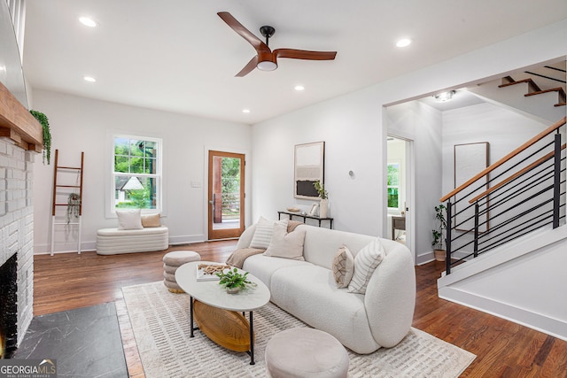 1721 S Gordon St SW, Atlanta, GA 30310 - living area with a brick fireplace, stairway, wood finished floors, a ceiling fan, and recessed lighting