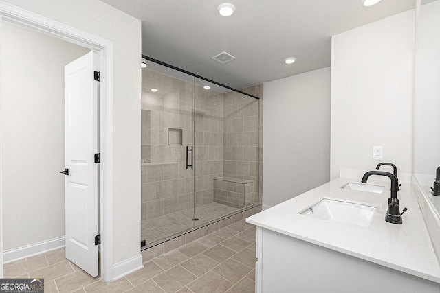 500 Cantrell Dr, Dallas, GA 30157 - bathroom featuring a stall shower, double vanity, recessed lighting, and tile patterned flooring