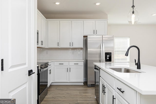 500 Cantrell Dr, Dallas, GA 30157 - kitchen featuring range, light countertops, dishwasher, white cabinetry, and recessed lighting