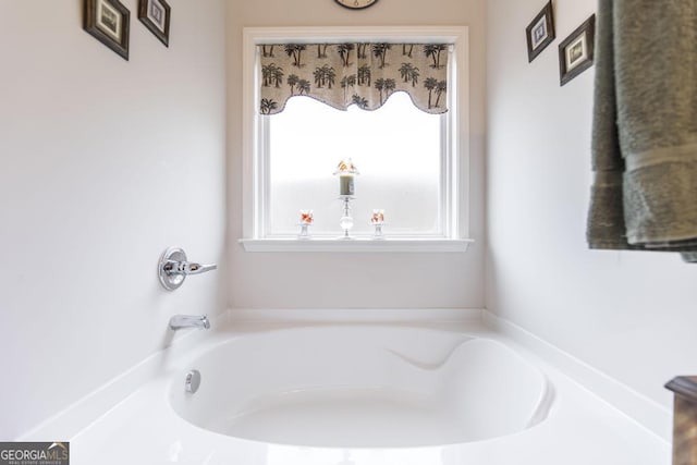 128 Arbor Crk, Warner Robins, GA 31093 - bathroom with a garden tub
