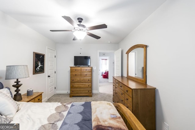 128 Arbor Crk, Warner Robins, GA 31093 - bedroom featuring light colored carpet, baseboards, and a ceiling fan