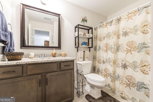 128 Arbor Crk, Warner Robins, GA 31093 - bathroom with toilet, vanity, and a shower with curtain
