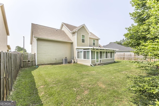 128 Arbor Crk, Warner Robins, GA 31093 - rear view of property with central air condition unit and a sunroom