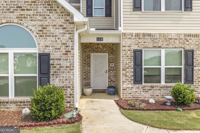 128 Arbor Crk, Warner Robins, GA 31093 - doorway to property featuring brick siding