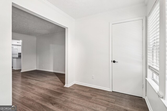 1931 Brian Way, Decatur, GA 30033 - unfurnished room featuring ornamental molding and wood finished floors