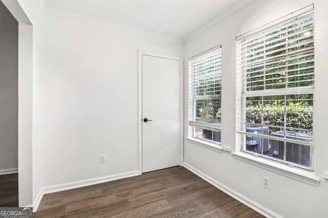 1931 Brian Way, Decatur, GA 30033 - empty room featuring dark wood-style floors and crown molding