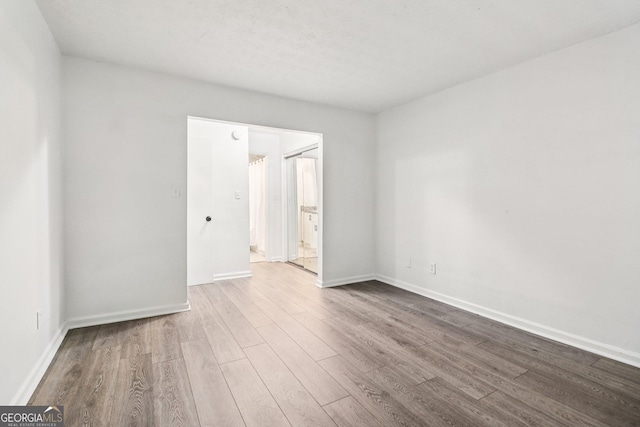 1931 Brian Way, Decatur, GA 30033 - unfurnished bedroom with wood finished floors and baseboards