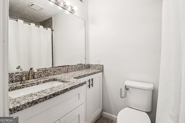 1931 Brian Way, Decatur, GA 30033 - bathroom featuring double vanity and baseboards