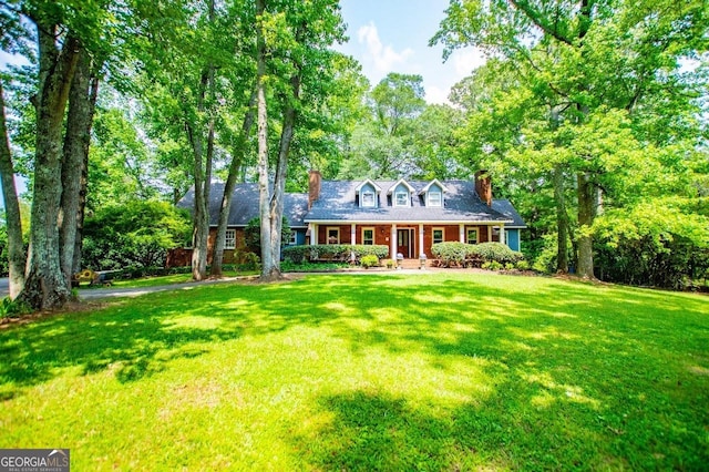 3187 Oak Grove Church Rd, Carrollton, GA 30117 - cape cod house with a front yard and a chimney