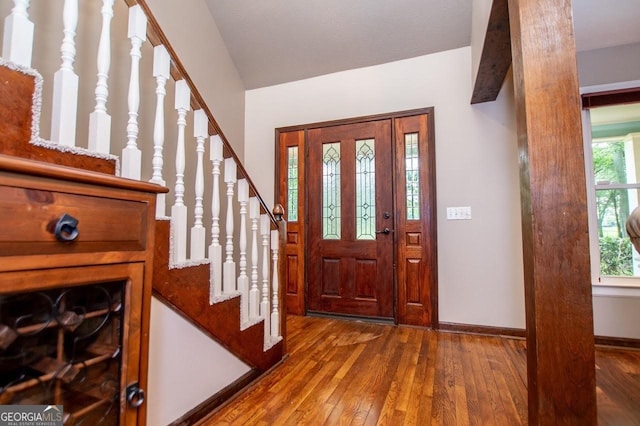 3187 Oak Grove Church Rd, Carrollton, GA 30117 - entrance foyer with hardwood / wood-style flooring, stairway, and baseboards