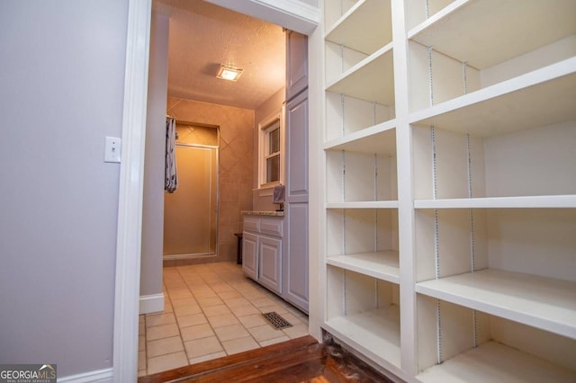 3187 Oak Grove Church Rd, Carrollton, GA 30117 - hallway with light tile patterned floors