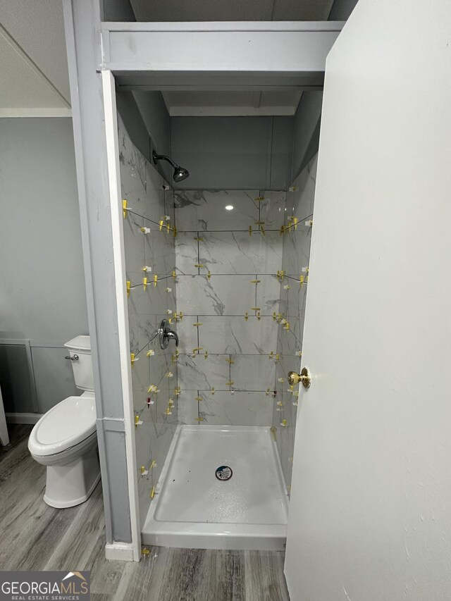 19 Poole Cir, Ellenwood, GA 30294 - full bath with wood finished floors, toilet, and a marble finish shower