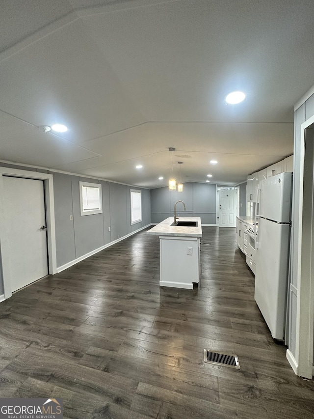 19 Poole Cir, Ellenwood, GA 30294 - kitchen featuring white appliances, a sink, white cabinetry, open floor plan, and light countertops