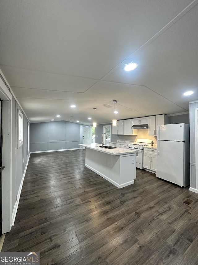 19 Poole Cir, Ellenwood, GA 30294 - kitchen with white appliances, a sink, under cabinet range hood, open floor plan, and a kitchen island with sink
