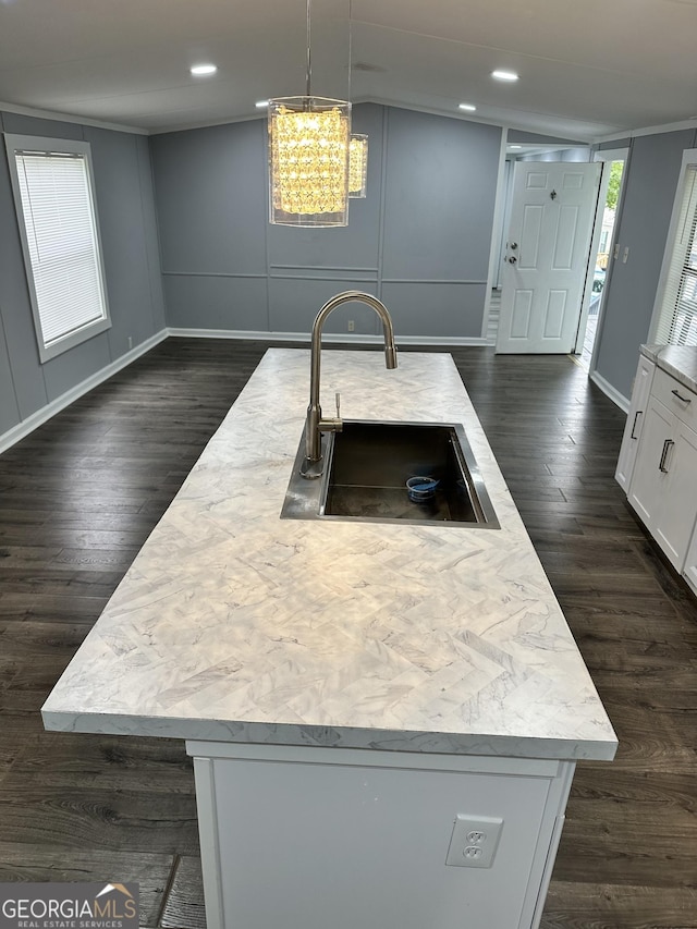 19 Poole Cir, Ellenwood, GA 30294 - kitchen with a sink, dark wood-type flooring, white cabinetry, a center island with sink, and recessed lighting