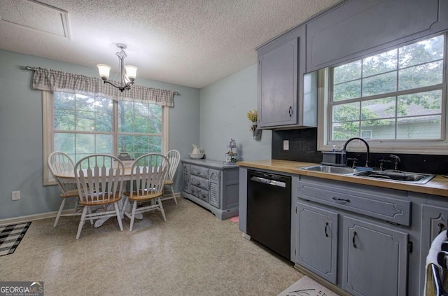 62 Lazy Water Dr SW, Cartersville, GA 30120 - kitchen with dishwasher, gray cabinetry, healthy amount of natural light, and a textured ceiling