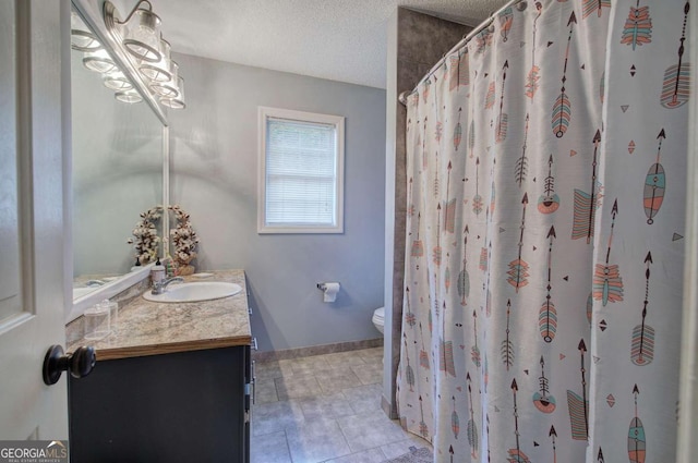 62 Lazy Water Dr SW, Cartersville, GA 30120 - bathroom featuring vanity, tile patterned floors, a textured ceiling, and curtained shower