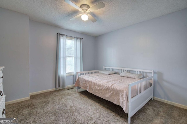 62 Lazy Water Dr SW, Cartersville, GA 30120 - carpeted bedroom with a textured ceiling and ceiling fan