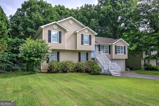 62 Lazy Water Dr SW, Cartersville, GA 30120 - split level home featuring asphalt driveway, a garage, and stairs