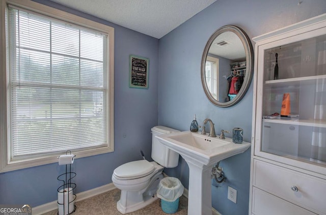 62 Lazy Water Dr SW, Cartersville, GA 30120 - bathroom featuring toilet and a textured ceiling