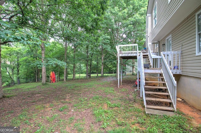 62 Lazy Water Dr SW, Cartersville, GA 30120 - view of yard with stairway and a wooden deck