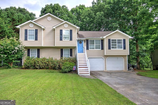 62 Lazy Water Dr SW, Cartersville, GA 30120 - tri-level home with driveway, a garage, and a front lawn